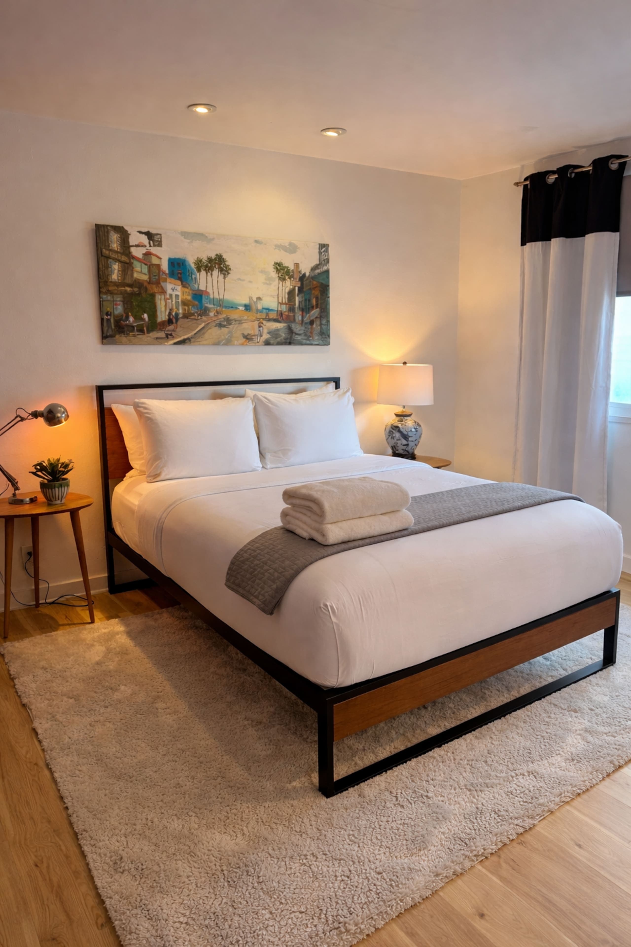 Guest bedroom made up in white linen